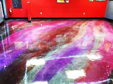 epoxy floor with hues of red and purple
